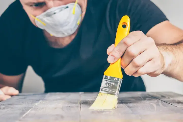 Man painting a table