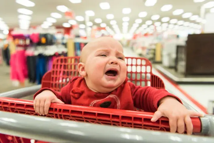 Crying baby in a store